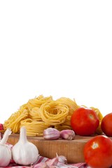 Raw fettuccine with tomatoes, garlic and onions