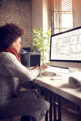 Female works in architect project office