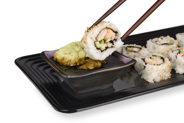 Sushi roll and chopsticks