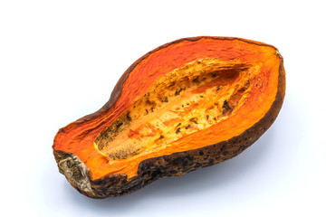 Papaya is ripe yellow-orange. It was kept so rotten and moldy on isolated white background.