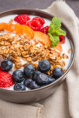 Yogurt with baked granola and berries
