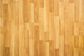 Laminate wooden floor surface in the modern home background.