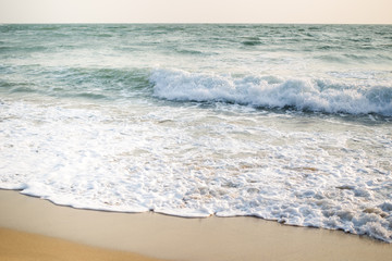 Photograp of small wave in beautiful sunlight.