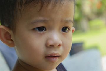 little asia boy in black shirt