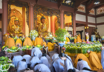 Ho Chi Minh City, Vietnam - May 10th, 2017: Buddhist revered ceremony in temple beautiful architecture, many statues sanctuary express cultural beauty of religious spirituality in Ho Chi Minh, Vietnam