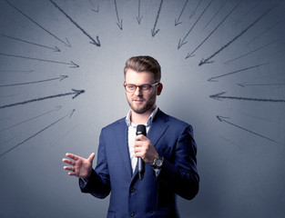 Businessman holding microphone