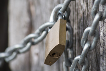 chain lock on wooden wall