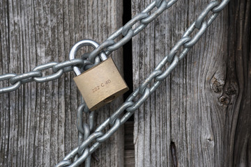 chain lock on wooden wall