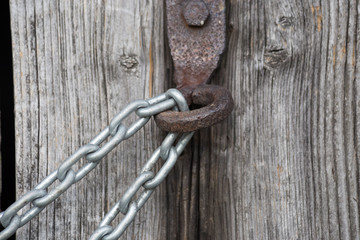 chain lock on wooden wall