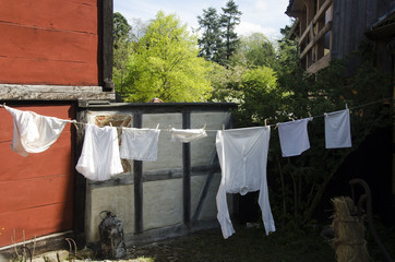 Laundry hanging in a backyard like in the old days.