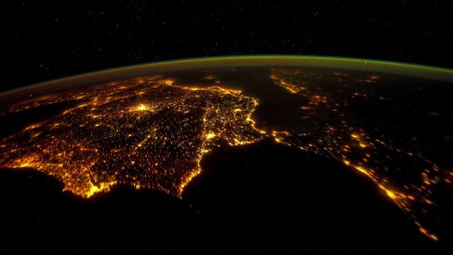 Spain at Night. From Atlantic Ocean, Western Sahara, to northeastern Spain, near the Pyrenees. Visible: Canary Islands, Strait of Gibraltar, Iberian Peninsula, Madrid, France and Balearic Islands. 