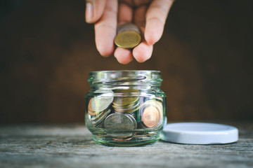 Hands women holding coin selective and soft focus hipster tone