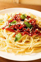 Italian dish - pasta with sundried tomato and basil