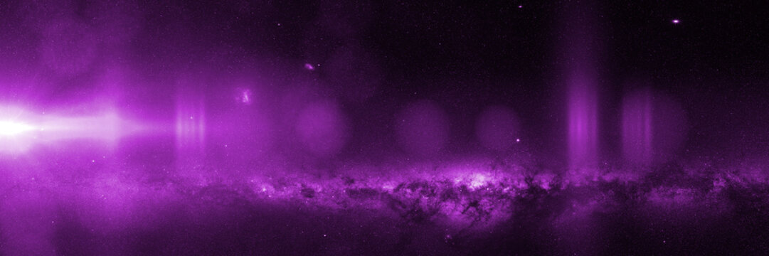 bright purple star in front the Milky Way galaxy