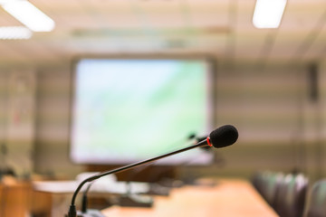 Black microphone in conference room ( Filtered image processed vintage effect. ) .