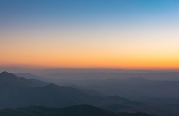 Fototapeta na wymiar Twilight sunset time: mountain layer background at Chiangmai province, Thailand