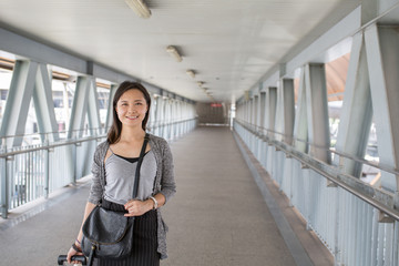 Fototapeta na wymiar Asian woman traveller walking
