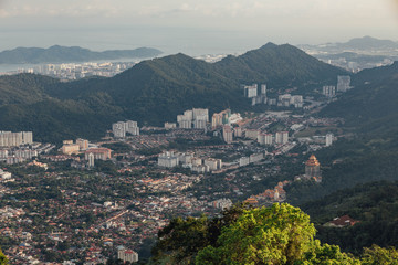Obraz premium Cloudy sky, cityscape and mountain with green that viewed from Penang Hill at George Town. Penang, Malaysia.