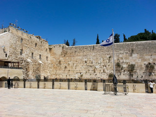 Western Wall in Jerusalem at day time and blue sky.