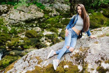 Naklejka na ściany i meble long hair woman posing in mountains