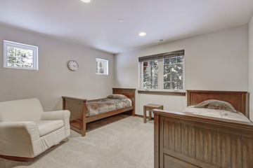 Spacious Kids bedroom with light beige walls