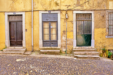 Fototapeta na wymiar Lisbon old facade, detail of an old street portugal, tourism