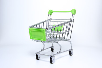 Isolated picture : Mini Supermarket cart.