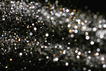 Water Spray Bokeh on the black background.