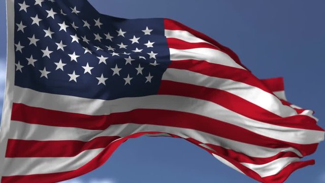 Flag of USA blowing on the wind, close up looped slowmotion