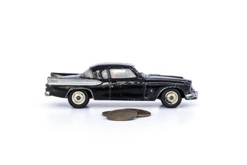 broken car and coins