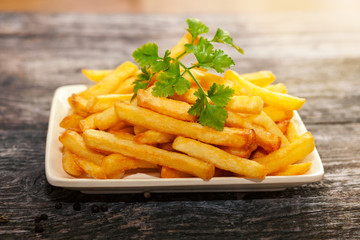 Plate with french and parsley on the top