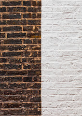 Old grunge brick texture background with new brick
