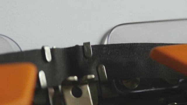 Close up footage of a person writing ABORTION on an old typewriter, with sound...