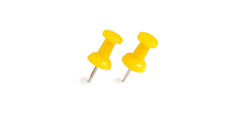 two isolated yellow push pins in white background