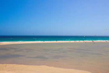Fuerteventura - La Playa de la Barca,  very popular place for watersport .It organize the World Championships of Surfing and Kitesurfing

