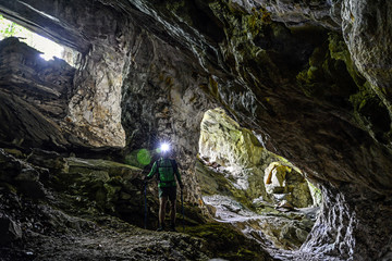 man exploring cave