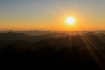 Orange sunset over the appalachian mountains.