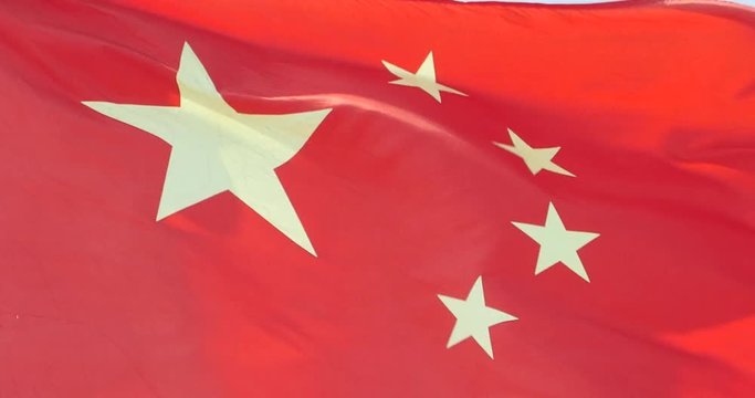 4k Chinese flag flutters in wind.