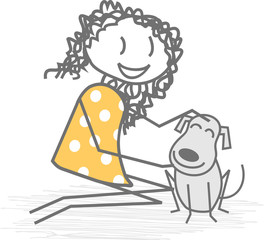 Un enfant ou une femme à genoux caresse un chien