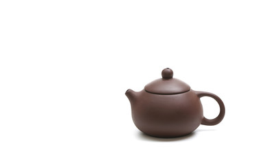 purple clay teapot isolated on white background