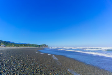Beautiful Punakaiki beach in West Coast  in blue sky , South Island of New Zealand
