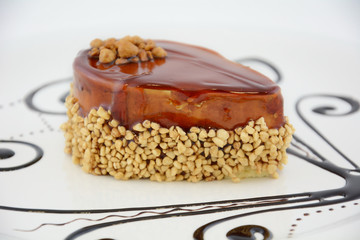 Cake with caramel topping and nuts