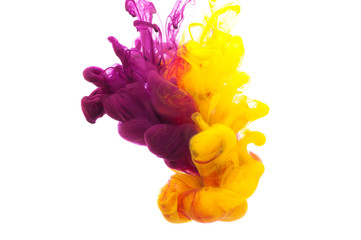 Abstract yellow and violet ink in the water as smoke, isolated on white background