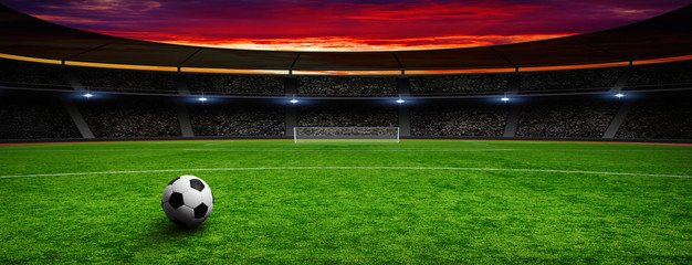 Soccer ball on green stadium © Alekss