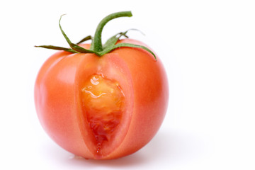 Fresh red tomato isolated on white