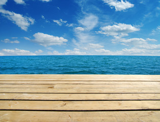 Fototapeta premium Wood, blue sea and sky