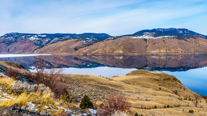 Kamloops Lake, which is a very wide portion of the Thompson River, on a cold winter day with the...