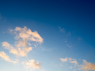 Obraz premium Blue bright sky with white clouds on sunny day. The vast blue sky and clouds sky.Beautiful background. Beautiful blue sky.