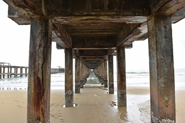 Bottom of the fishing pier on a rainy day, Thailand.