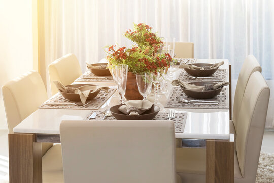dining table in modern home with elegant table setting for breakfast